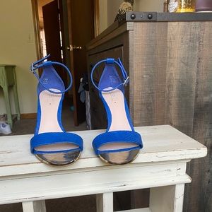Blue heels with gold tip detail